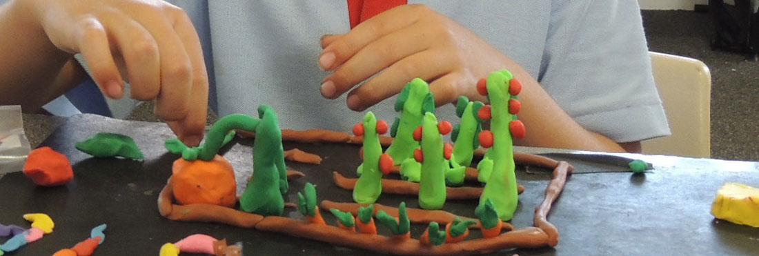 Students preparing clay for a clay annimation film